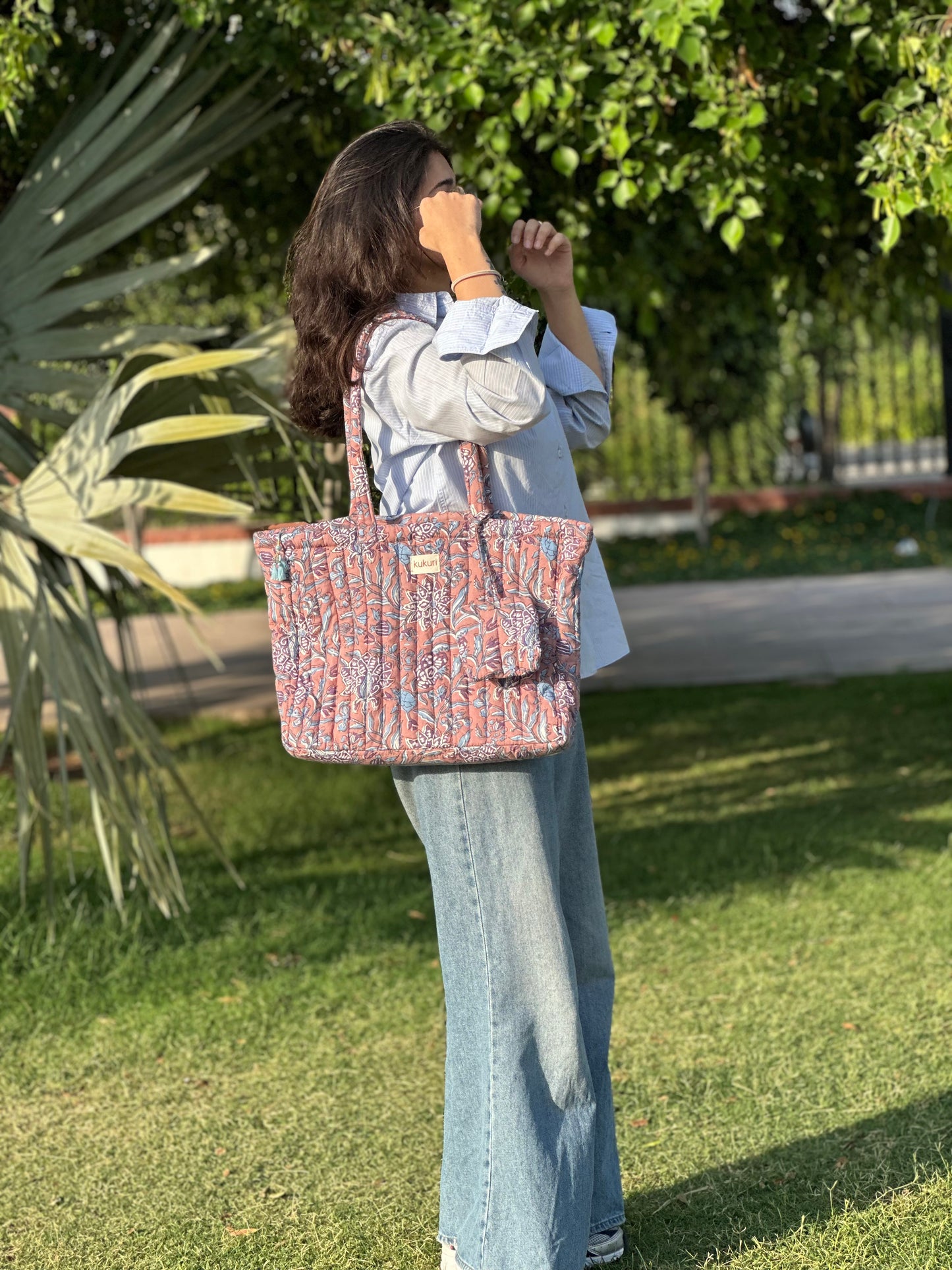 Brown floral laptop tote bag