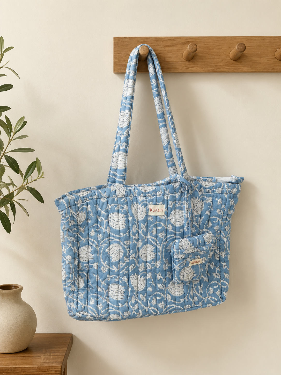 Light blue floral laptop tote bag