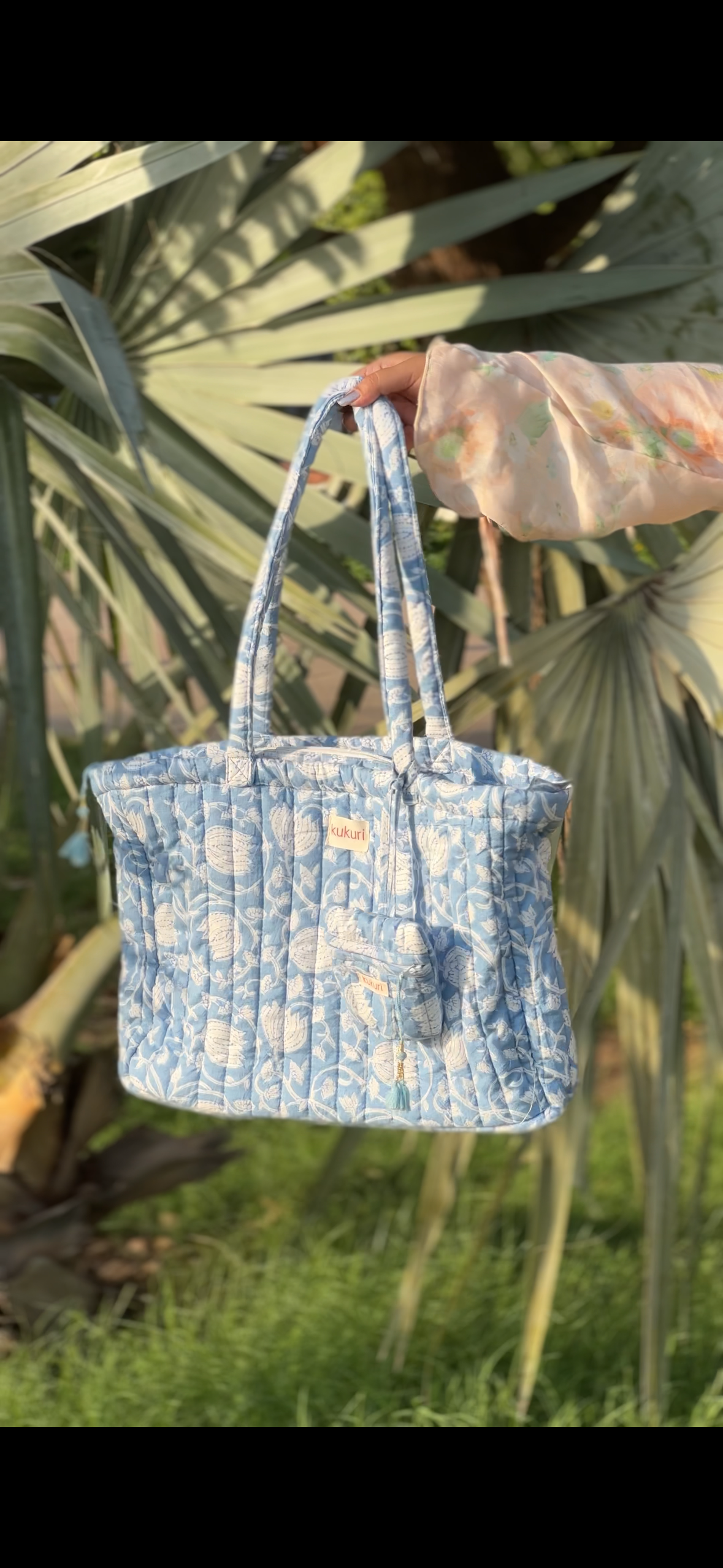 Light blue floral laptop tote bag